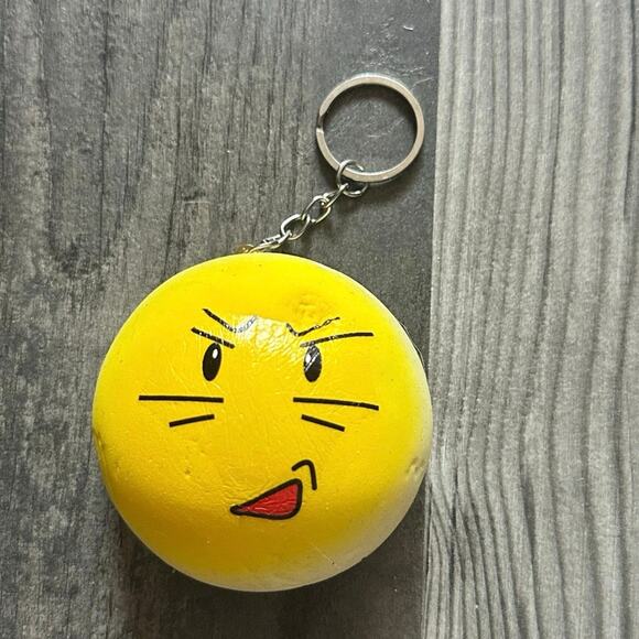 yellow silly face squishy keychain - Picture 1 of 3